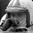 Chris Amon (NZL) Ferrari 312 in reflective mood, retired with broken gearbox.
British Grand Prix, Rd6, Silverstone, England. 19 July 1969. &copy; Sutton Motorsport Images